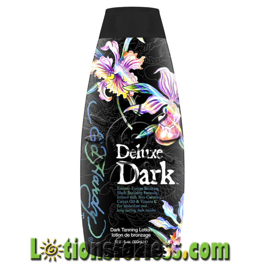 Ed Hardy Deluxe Dark Bronzer 10oz bottle with floral design, featuring DHA and natural bronzers for a deep tan.